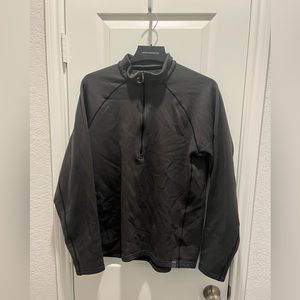 Men’s Kuiu Peloton 200 quarter zip pullover.